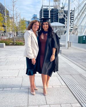 Sue McFarlane (L) and her daughter Nikki at her graduation