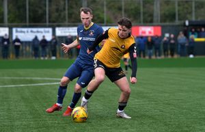 Rushall Olympics' Callum Coyle and Kyle Hammond battle for the ball