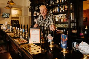 The Seven Stars, Stourbridge. with landlord Peter Walker behind the bar.