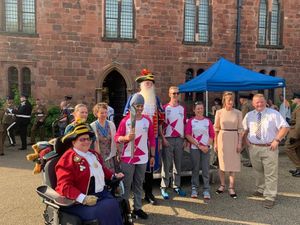 Baton-bearers and dignitaries with the baton at Shrewsbiury Castle with the baton. Photo: Shropshire Council.