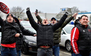 Walsall fans protest about the board at Banks's Stadium.