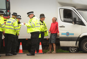 Officers speak to a driver during an Operation Close Pass session