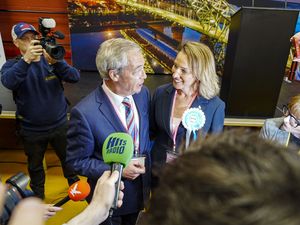 Reform UK’s Sarah Pochin and party leader Nigel Farage speak to the media