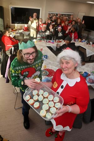 Guests invited to the Midland Metropolitan University Hospital enjoy a Christmas party  