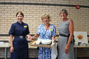 Jules Lewis and Julia Clarke with Jules Lock who made the Swan Fund birthday cake.
