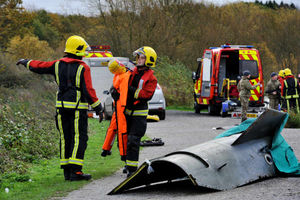 A firefighter carries a 'victim'