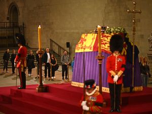 Supporting image for story: Royal guard collapses next to Queen’s coffin on first night of lying in state