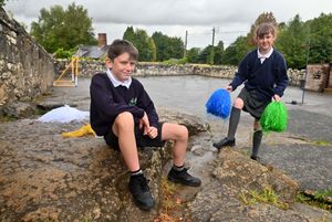 The famous Grinshill sandstone is a feature in the school's playground. In picture: George Trow (left) and Bardy Currie