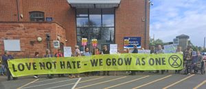 Campaigners gathered outside the Shropshire Council headquarters to call for 'love, not hate'. Picture: XR Shrewsbury