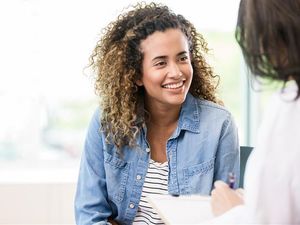 Therapist in clinic with client