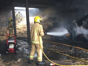 Supporting image for story: Digger damaged in Whitchurch farm building fire 