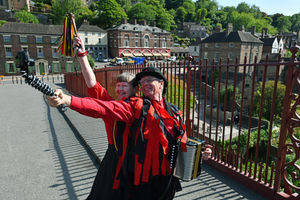 Morris dancers Pat and John Parnell are usually performing on ironbridge with about 40 of their fellow dancers The Ironmen & Severn Gilders but due to the lockdown the meetigs have been suspended. The group have been meeting by Zoom each week to practice but now they are taking in a virtual Morris Dance and today they did their own video for the event on The Ironbridge.
