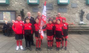 Knighton Junior Football Club and Knighton Town Football Club. Gary Cooper, Ian Pearmain, Simon Harris Owen, Dougie, Ezmai, Ruby, Mason, Travis, Robyn at the service. (Image: supplied)