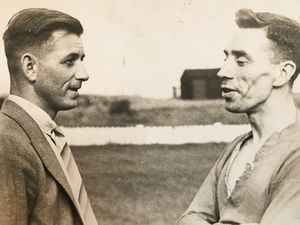 Reginald 'Roger' Jones (right) in his playing days. Photo: Hansons