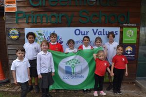 Greenfields pupils celebrate their award