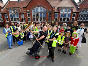 Supporting image for story: Beloved Shrewsbury school caretaker surprised with 425 mini-mes at retirement send-off