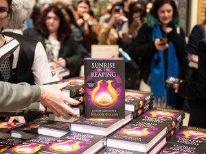 Fans attend a launch event for the new Hunger Games novel, Sunrise On The Reaping by Suzanne Collins at Waterstones Piccadilly in London