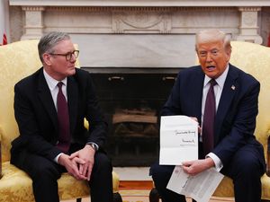 US President Donald Trump sitting with Prime Minister Sir Keir Starmer in the Oval Office at the White House