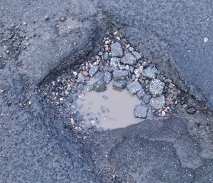 A pothole in Dudley where councillors say it can take up to two months for repairs. Picture Cllr Shaukat Ali free for LDR use