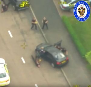 Aerial footage shows the unmarked car with Hussain at the wheel