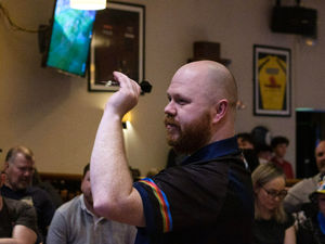 Supporting image for story: Hood hits the bullseye with city's darts fans