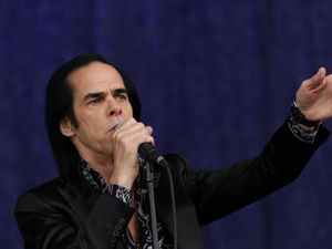 Nick Cave performing at the Glastonbury Festival in 2013