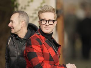 Supporting image for story: Steps singer Ian ‘H’ Watkins among mourners arriving at funeral of The Vivienne