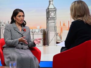 Dame Priti Patel speaking on a television set