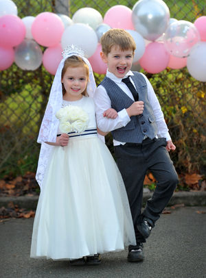 'Bride and groom' Phoebe Eades, aged 4 and Joel Wallis, aged 5