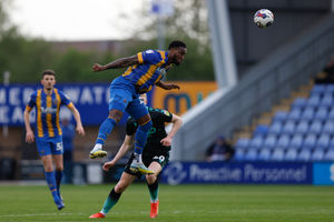 Chey Dunkley of Shrewsbury Town and Josh Coburn of Bristol Rovers (AMA)