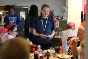 Telford College students serving a festive feast to members of the Dawley Dinner group at the college’s Orange Tree restaurant in Wellington.