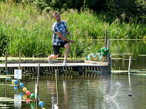 Supporting image for story: Hundreds at British stone skimming championships in Shropshire - with pictures