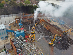 Supporting image for story: Road closures still in place as fire crews work overnight to battle major Tipton scrapyard fire