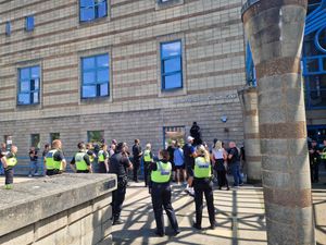 Supporting image for story: Watch: Anger outside court after trio cleared of murdering father as police get involved