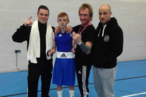 James Mongan celebrates with Priory Park Boxing Club - after beating Muhammad Ali!
