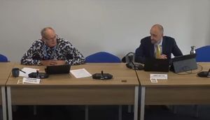 James Walton (executive director for finance at Shropshire Council) explains to the Audit Committee the current financial position of the North West Relief Road project. Chairing the committee was Councillor Duncan Kerr (middle). Picture: Shropshire