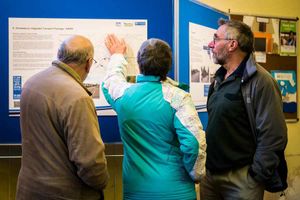 People looking at the plans