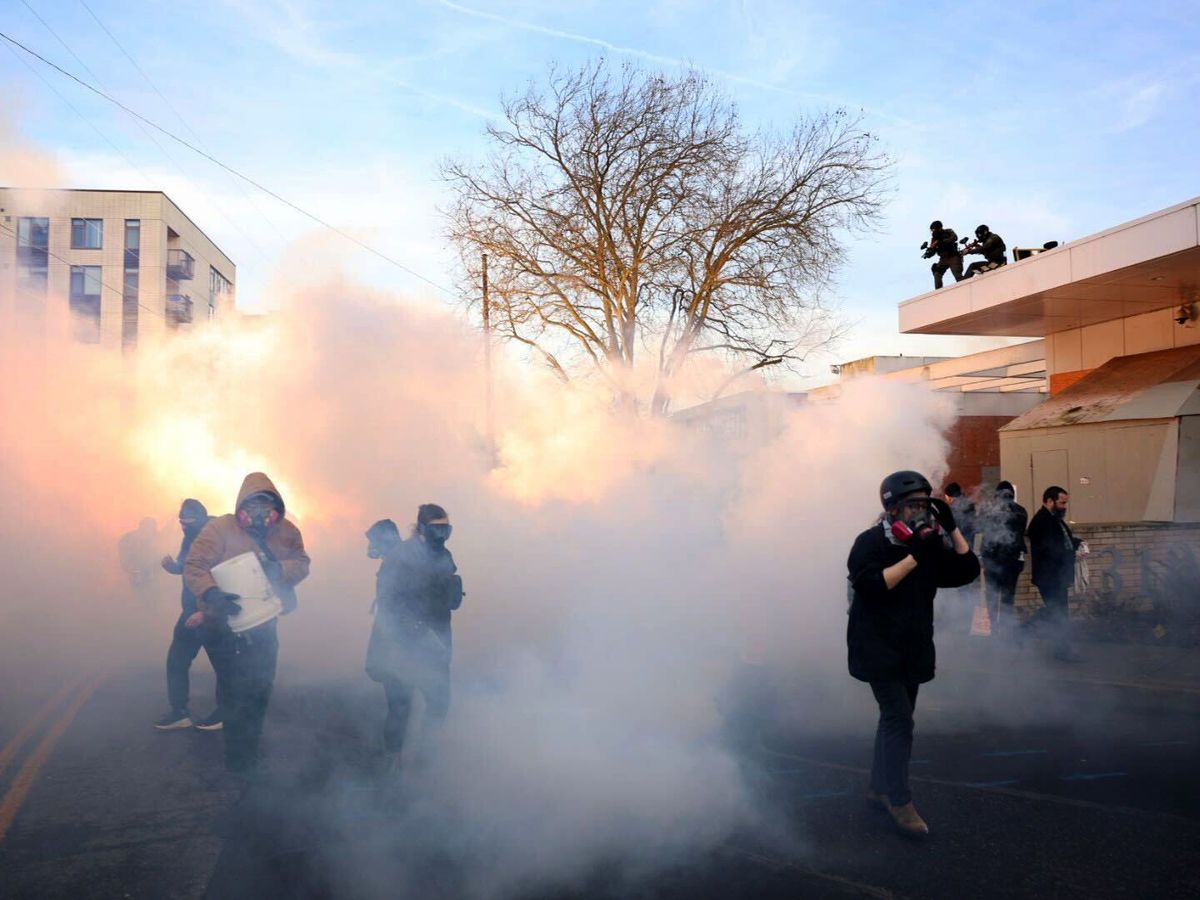 Portland mayor demands immigration enforcement leave city after using tear gas
