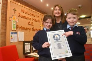 Bomere Heath C of E Primary School near Shrewsbury. Head: Sallie Roberts with pupils: Connie 7 and Ollie 7, with there Guinness World Record certificate.