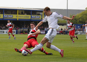 Rob Elvins of Solihull Moors and Adam Farrell of AFC Telford United