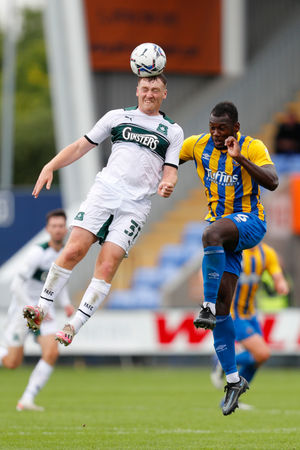 Luke Jephcott of Plymouth Argyle and Aaron Pierre of Shrewsbury Town (AMA)
