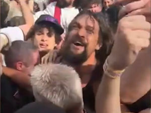 Supporting image for story: The unforgettable moment Jason Momoa surprises metal fans at Black Sabbath's Villa Park farewell concert by joining the mosh