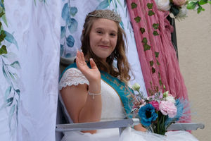 Carnival Princess Demi-Jade Clements waves to the crowds. Image by Andy Compton