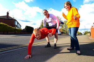 Supporting image for story: Friends are pushing the boundaries with human wheelbarrow record bid