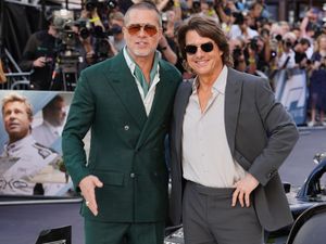 Supporting image for story: Brad Pitt embraces Tom Cruise at F1: The Movie premiere