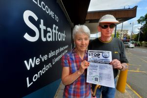 Alison and Mark Howard from Stafford pictured with a leaflet about ticket office closures.