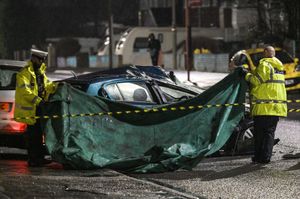 Police covered up the car in the aftermath of the crash. Photo: SnapperSK