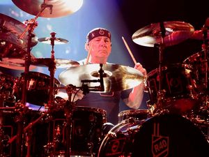Supporting image for story: Dave Grohl leads tributes to Rush drummer Neil Peart