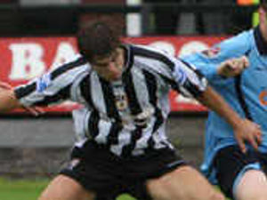 Supporting image for story: Backing for Mills after breaking duck