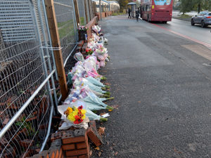 Supporting image for story: Roadside tributes left to girl, 16, and 19-year-old man killed in Oldbury crash